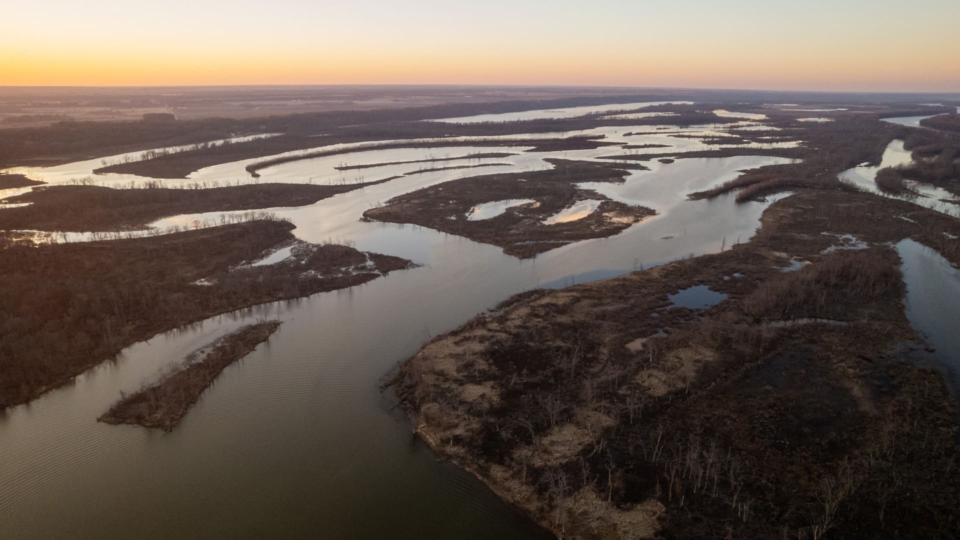 Aerial view of river backwaters and islands at sunset in December